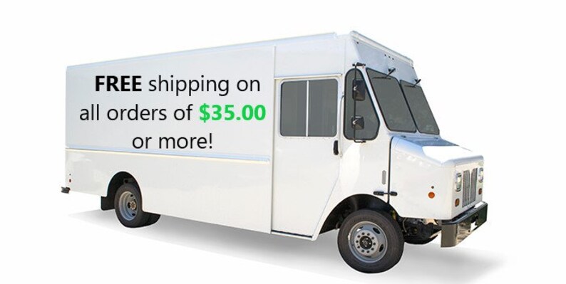 May include: A white delivery truck with the text "FREE shipping on all orders of $35.00 or more!" on the side. The truck has a boxy design with a front cab, side door, and large windshield.