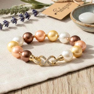Mother of Pearl Bracelet, 12mm Multi-Color Shell Pearls, CZ Infinity Lock, Stretch Bracelet