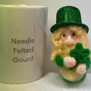 Needle felted leprechaun gnome with four leaf clover