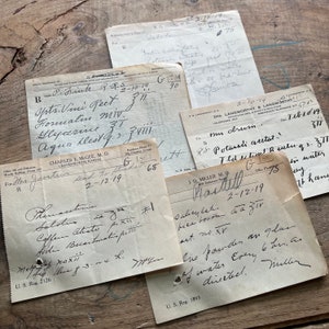 May include: Close-up of four vintage prescription slips with handwritten text. The slips are dated from 1914 to 1919 and include details like patient names, medications, and dosages. The paper is yellowed with age and has a worn, vintage aesthetic.