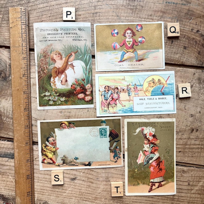 May include: A collection of vintage advertising cards and ephemera, including a card for Pictorial Printing Co. and a card for Presco Coal Dealer. Other cards feature illustrations of people and products.