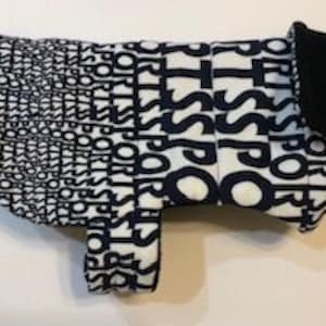 Reversible sport theme quilted fleece dog coat