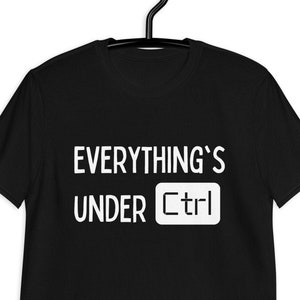 May include: Black t-shirt with white text that reads "Everything's Under Ctrl" with a white square representing the Ctrl key.