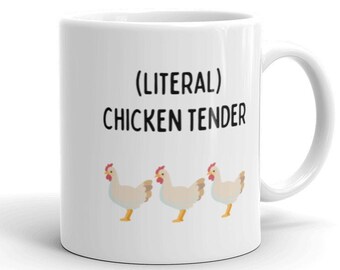 May include: White ceramic mug with a black graphic of three chickens and the text "(literal) chicken tender".