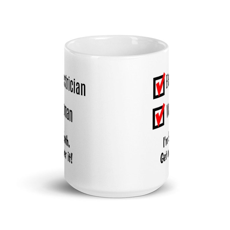 May include: White ceramic mug with black text that reads "Electrician.  I'm not a magician.  But I can make it work.  Get over it!"  Two checkboxes with red checkmarks are to the right of the text.