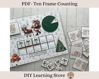 May include: A printable PDF activity sheet for kids featuring a ten frame counting activity with Christmas-themed images of presents and a Christmas tree. The sheet also includes a finger matching activity and a pie chart with the number 3.