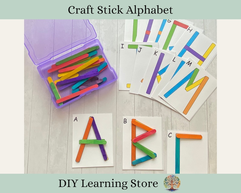 Laminated activity cards featuring letters of the alphabet along with colorful craft sticks placed on top in order to create the letters on each card.
