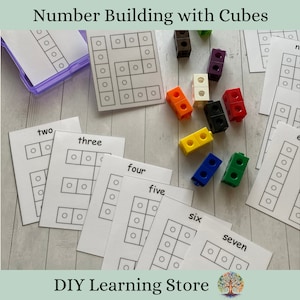May include: A set of printable number building cards with blank squares for kids to fill in with colorful cubes. The cards feature the words "two", "three", "four", "five", "six", and "seven".