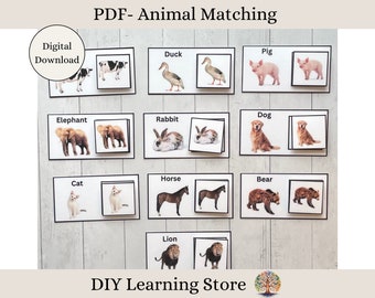 May include: A printable PDF download of an animal matching game. The game features 10 different animals, including a duck, pig, elephant, rabbit, dog, horse, bear, cat, and lion. Each animal is shown twice, with one image showing the animal's head and the other showing the animal's body. The game is designed to help children learn about different animals and their names.