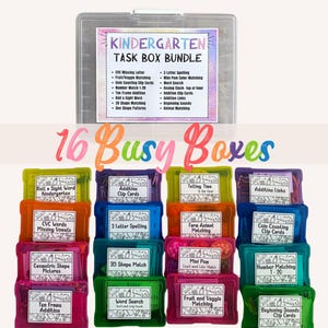 May include: A clear plastic container labeled "Kindergarten Task Box Bundle" sits above 16 colorful task boxes. Each box is a different color and labeled with educational activities like "Roll a Sight Word" and "Number Matching 1-20". The words "16 Busy Boxes" are written in pink.
