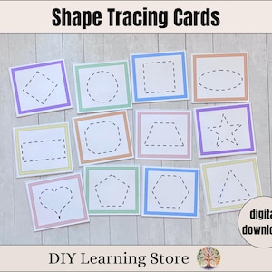May include: Shape tracing cards with various shapes, including a diamond, circle, square, and star. Each card features a dashed outline of a shape for tracing practice. The cards have colorful borders and are arranged on a light wood-grain surface. The text "Shape Tracing Cards" is at the top.