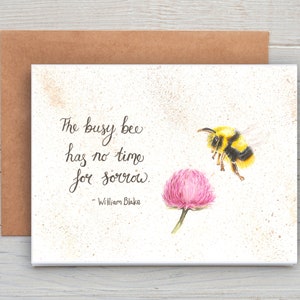 May include: A watercolor greeting card featuring a bumblebee, a pink flower, and the quote "The busy bee has no time for sorrow" by William Blake. The card is paired with a brown envelope.