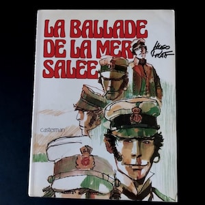 May include: A vintage book cover with the title "LA BALLADE DE LA MER SALEE" in red letters. The cover features illustrations of men in military-style hats and coats, with a signature in the upper right corner. The publisher's name, Casterman, is also visible.