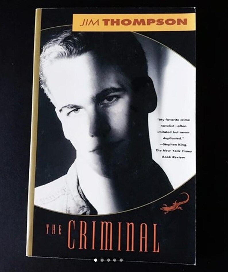May include: A black and white photo of a man on the cover of a paperback book titled "The Criminal" by Jim Thompson. The book cover features a quote from Stephen King about the author.