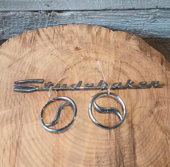Studebaker Chrome Emblem Set – Vintage Script Badge & Lazy S Logos