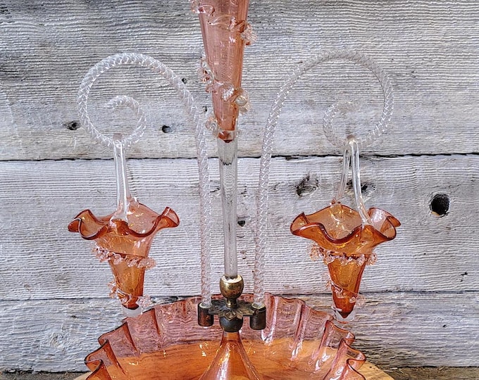 Featured listing image: Cranberry Glass Epergne | Antique Victorian Hand Blown Art Glass Centerpiece | Pink Ruffled Trumpet Vase with Hanging Baskets