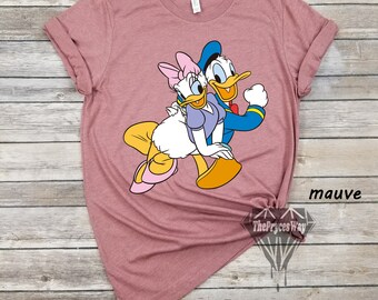 Camicia Daisy e Paperino, Camicia Disney da donna, Camicia Disney per coppie, Camicia Gruppo Disney, Camicia Daisy Duck, Camicia Paperino, Camicia Famiglia Paperina