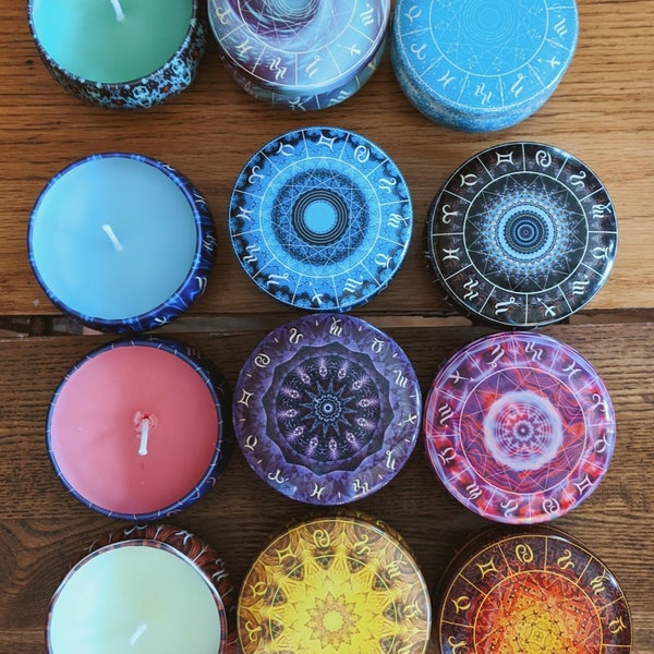 Colored candles in detailed tins