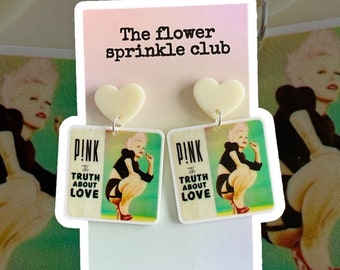 Pink earrings with heart tops