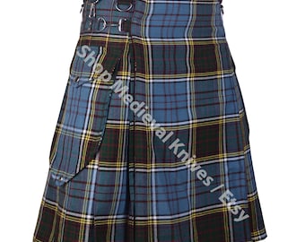 May include: A tartan kilt in shades of blue, green, and yellow, with metal buckles and straps. The kilt has a pleated design. The text "Shop Medieval Knives / Etsy" is printed on the kilt.