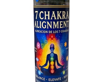 May include: A cylindrical candle with a blue and white label. The label features a meditating figure with colorful chakra symbols and the text "7 CHAKRA ALIGNMENT". Additional text includes "BALANCE, ELEVATE, HEAL". The top is wrapped in blue foil.