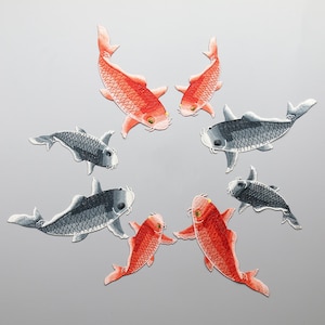 May include: Embroidered patches featuring koi fish in shades of red and gray, arranged in a circular pattern. The patches have detailed stitching, showcasing the fish scales and fins. These patches are ideal for adding a decorative touch to clothing or accessories.