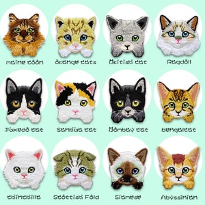 Pode incluir: Uma colagem de 12 patches bordados de raças de gatos. Cada patch apresenta uma raça de gato diferente, incluindo Maine Coon, tigrado laranja, British Shorthair, Ragdoll, Tuxedo, Calico, Bombay, Bengal, Chinchila, Scottish Fold, Siamês e Abissínio.