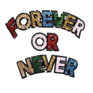 May include: A colorful sequined patch with the text "FOREVER OR NEVER" in a rainbow of colors. The letters are outlined in black and the sequins are arranged in a random pattern.