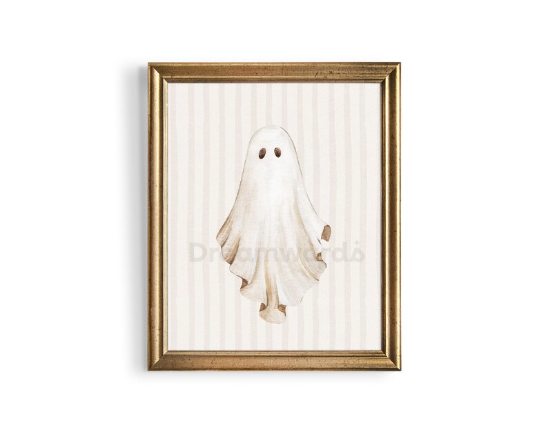 May include: A framed watercolor painting of a white ghost with two black eyes on a striped background.