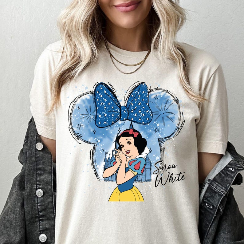 a woman wearing a snow white tee shirt