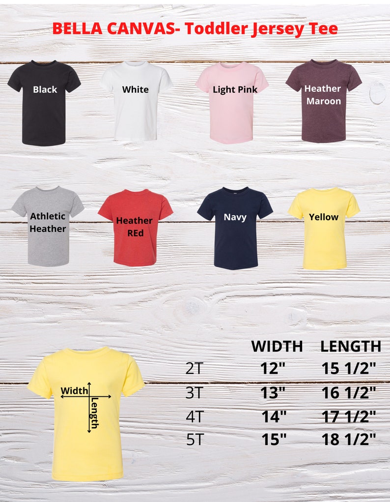 May include: A size chart for toddler t-shirts in various colors, including black, white, light pink, heather maroon, athletic heather, heather red, navy, and yellow. The chart shows the width and length measurements in inches for sizes 2T, 3T, 4T, and 5T.