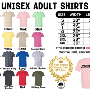 The adult cotton soft-feeling shirts feature Disney or various themed prints. They come in multiple colors and sizes, including adult, youth, toddler, and baby sizes. The print is vibrant and colorful, and it's located in the center of the shirt.