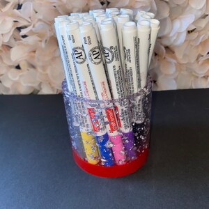 Pencil/pen holder