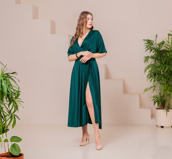 lauriell emerald green wrap front midi dress Adrianna Papell High Mock Neck Empire Waist Cap Flare Sleeves Velvet Short  Dress| Available at Curated Brands in Los Angeles main image 1