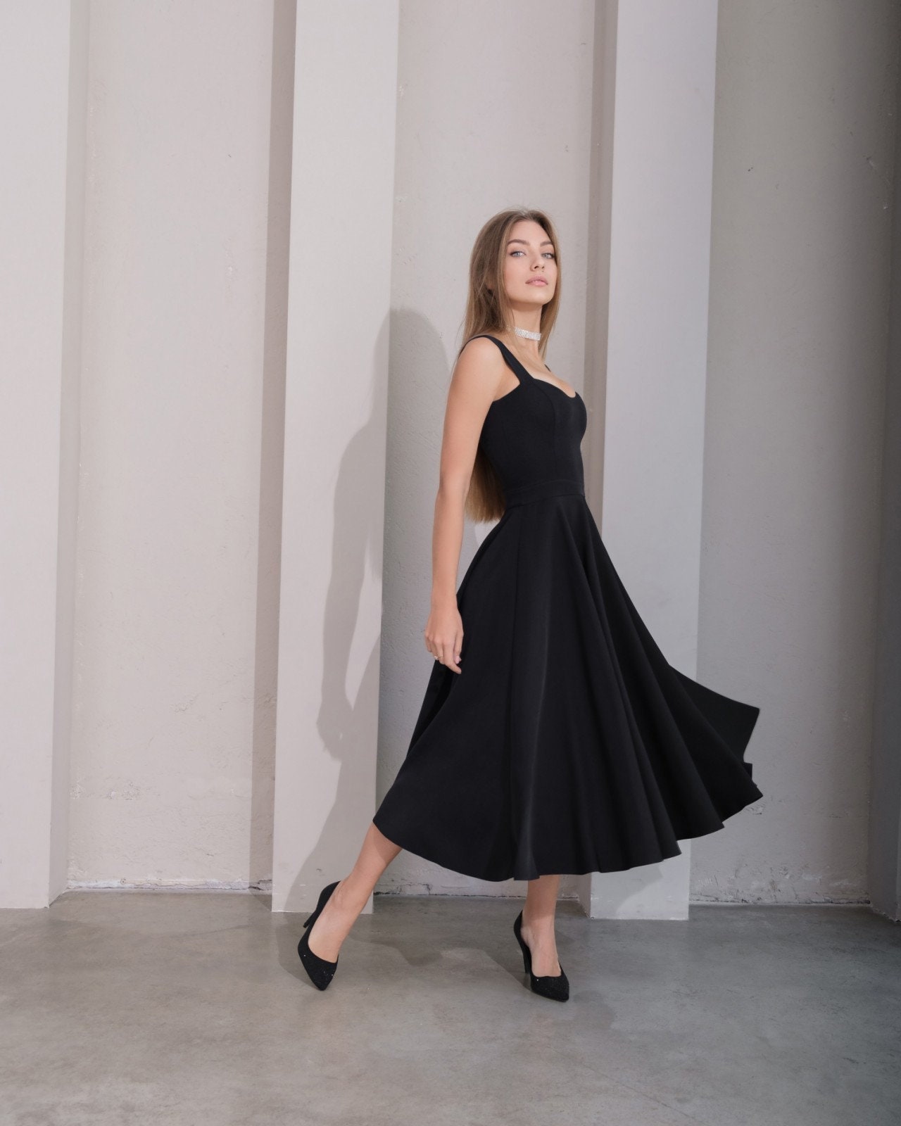 Black Midi Cocktail Dress: Sleeveless Fit & Flare A-Line Black Midi Cocktail Dress: Sleeveless Fit & Flare A-Line