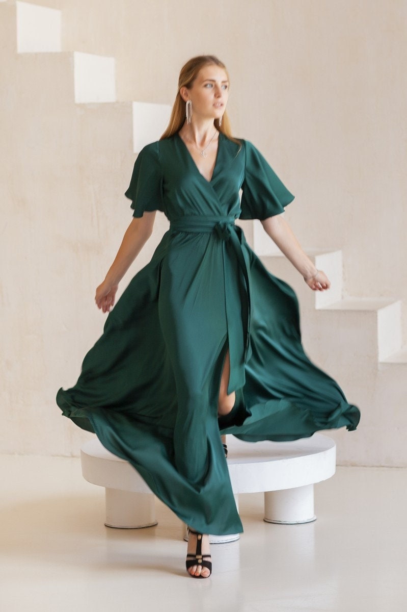 emerald green wrap over long sleeve bardot maxi dress Emerald Green Silk Maxi Dress: Elegant Wrap Gown with Butterfly Sleeves