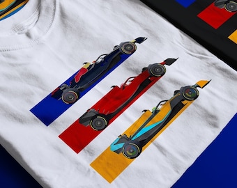May include: Five t-shirts with a colorful design of race cars on each. The design features a blue, red, yellow, and white stripe pattern with a black race car on each stripe.