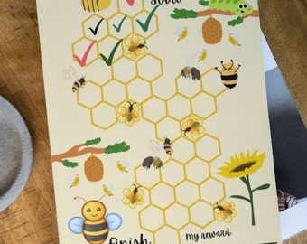 May include: A printable bee-themed chart with a honeycomb pattern and a path for children to follow. The chart includes a start and finish line, checkboxes, and a space for a reward. The chart is designed to help children learn about bees and their importance in the ecosystem.