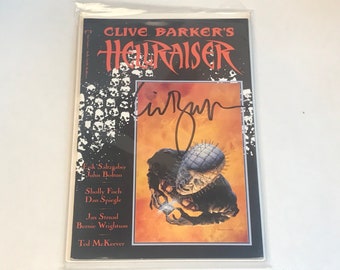 1st addition signed copy, Clive Barker’s Hellraiser. I met Clive Barker in California at comic store where he signed the book.