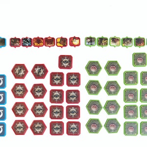 May include: A collection of game pieces for a board game. The pieces are made of plastic and come in a variety of colors, including yellow, blue, red, and green. There are also black and white tokens.