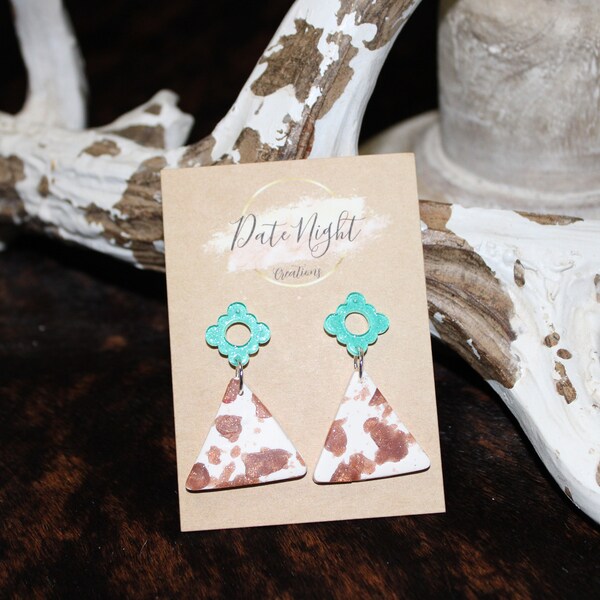 Turquoise and cow print dangle earrings