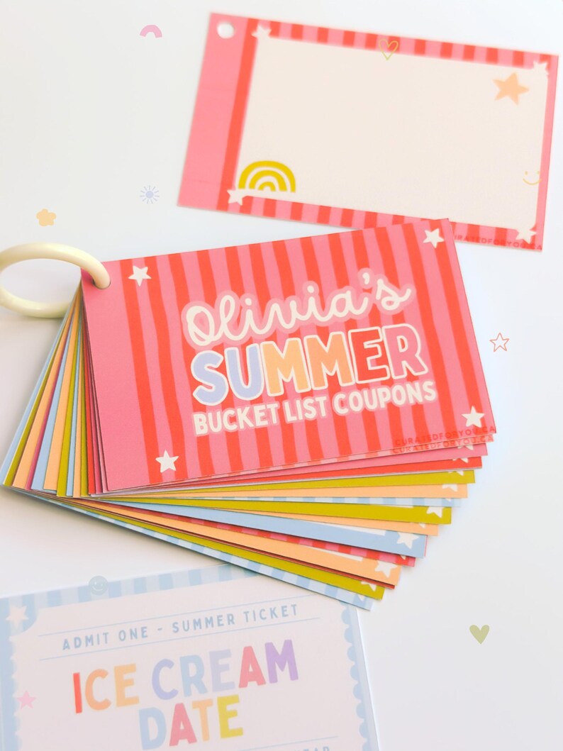 May include: A set of rectangular paper coupons bound by a white plastic ring. The cover features pink vertical stripes, white stars, and the text Olivia's SUMMER BUCKET LIST COUPONS. Additional loose cards show pastel colors and text including ICE CREAM DATE.