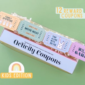 May include: A set of 12 colorful reward coupons in a box with a rainbow and the text "Kids Edition". The coupons are shaped like tickets and feature various activities, including "Family Adventure", "Movie Night", "Time Alone With Mom", and "Wild Card".