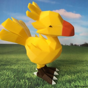 May include: A yellow, low-poly 3D printed model of a Chocobo, a bird-like creature from the Final Fantasy video game series. The model has a red beak and brown legs with white claws.