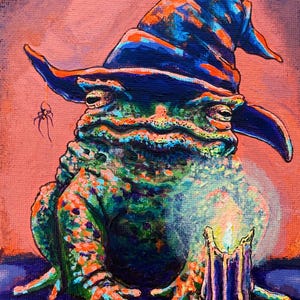 May include: A whimsical painting of a frog wearing a blue wizard hat. The frog is green and orange, with a candle and a spider in the background. The artwork has a fantasy theme and is painted on canvas.