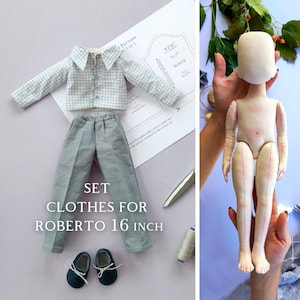 May include: A set of clothes for a 16-inch doll, including a plaid shirt, gray pants, and black shoes. The doll is not included in the image. The text "SET CLOTHES FOR ROBERTO 16 INCH" is printed on the image.