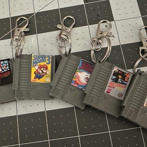 Retro game cartridges nes snes keychains