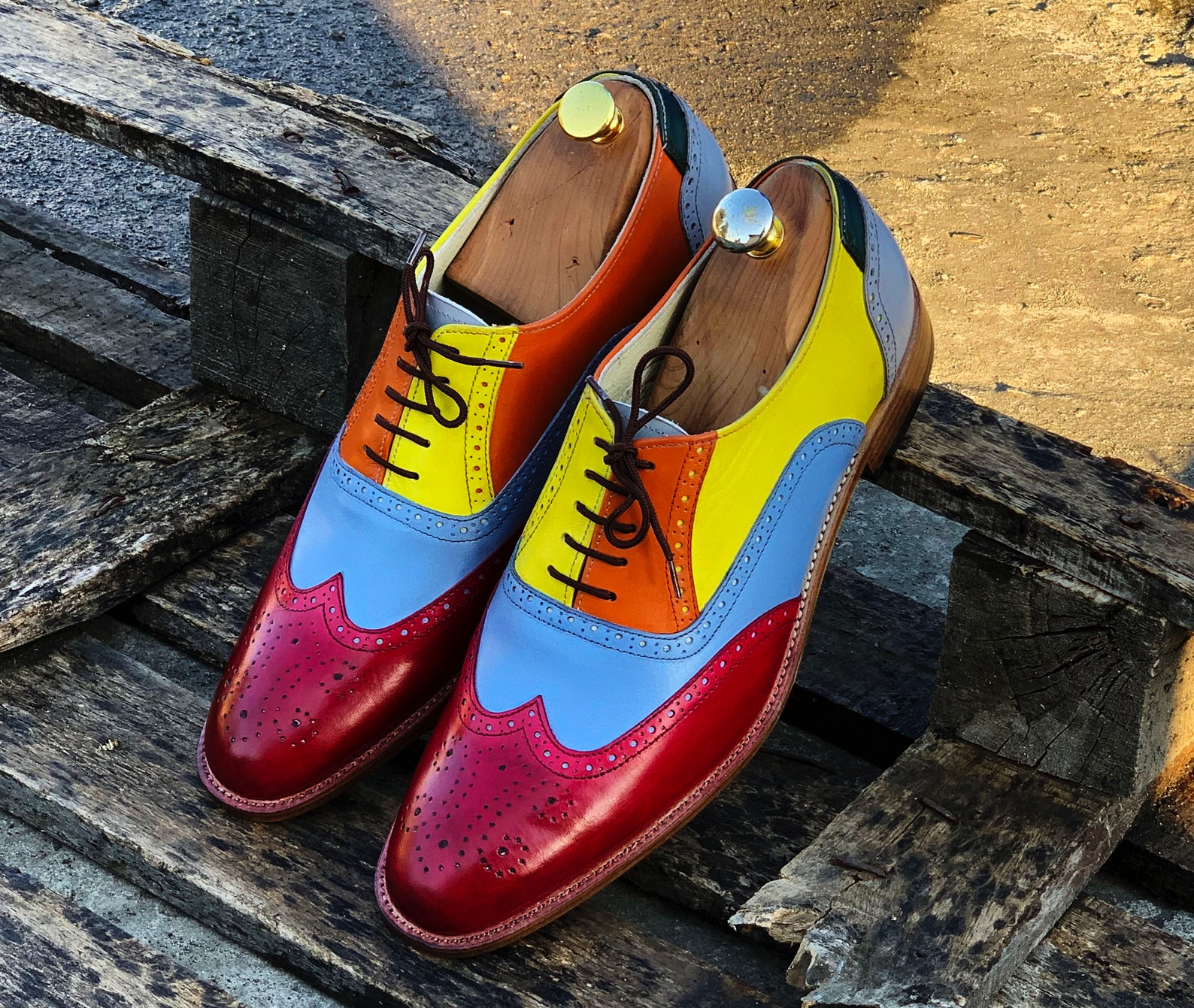 multi colored wingtip shoes