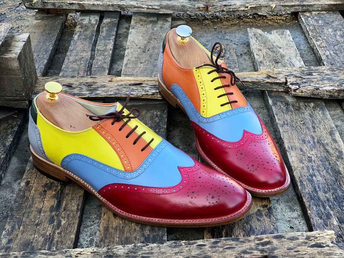 multi colored wingtip shoes