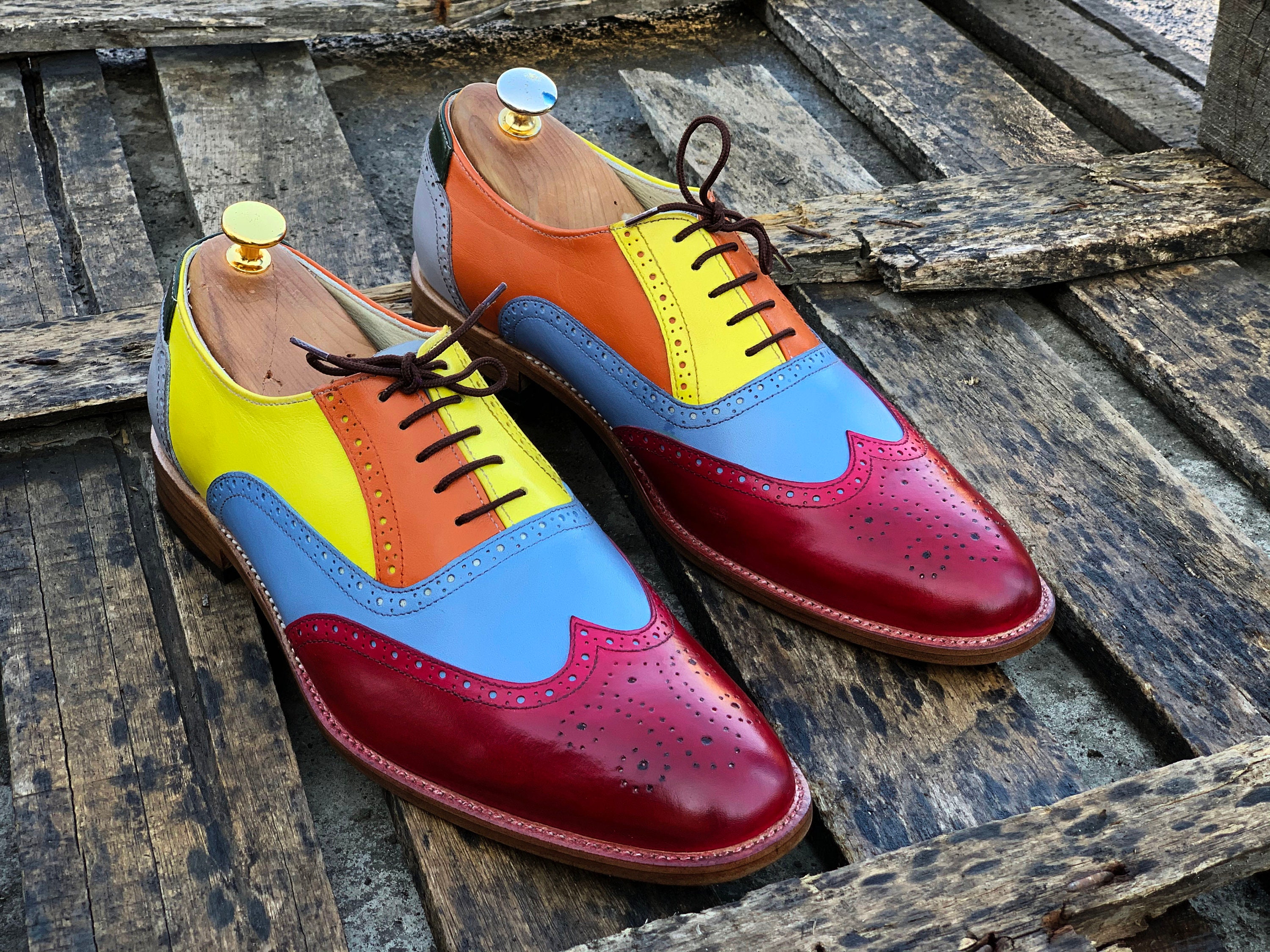 multi colored wingtip shoes